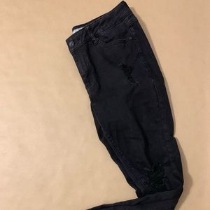 Skinny distressed black jeans
